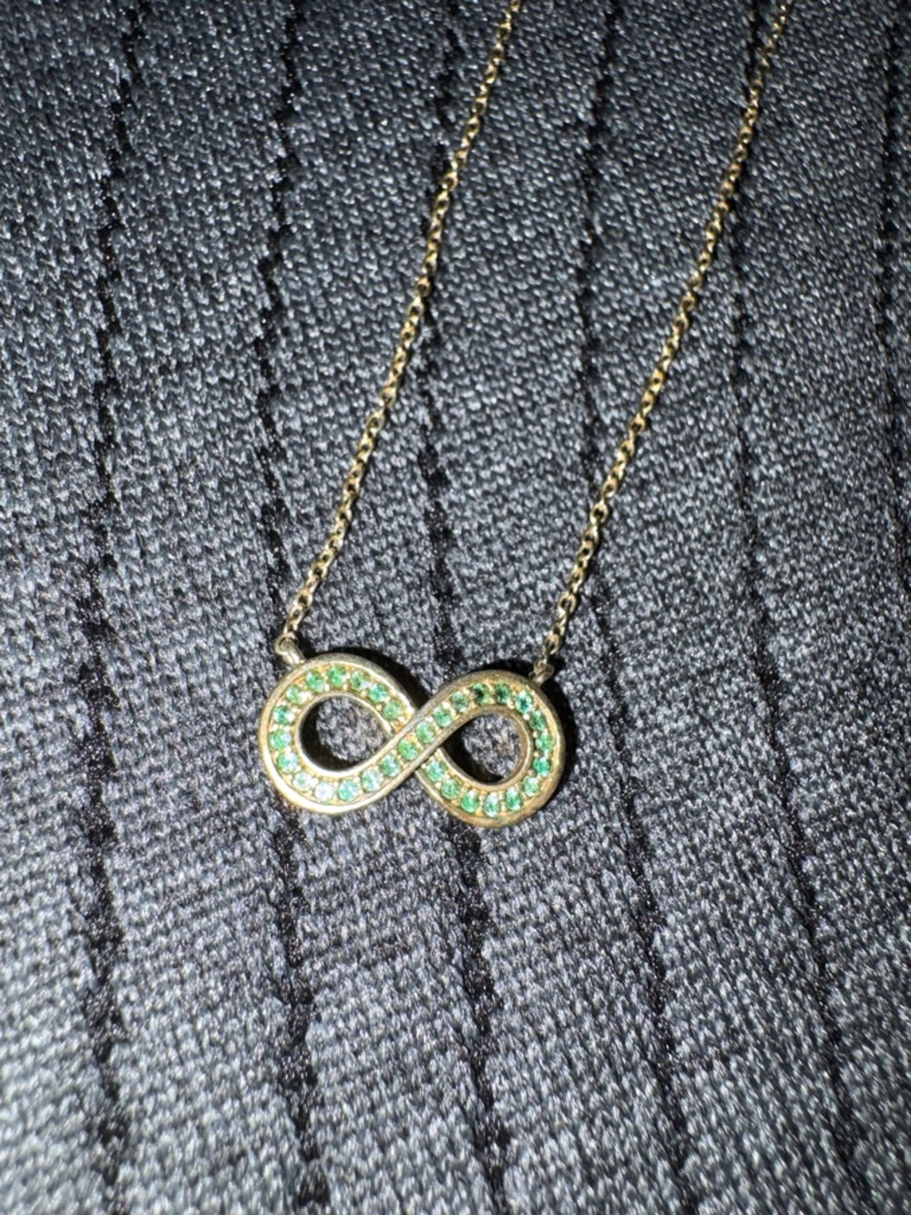 Gold Infinity Pendant Necklace with Green Stones